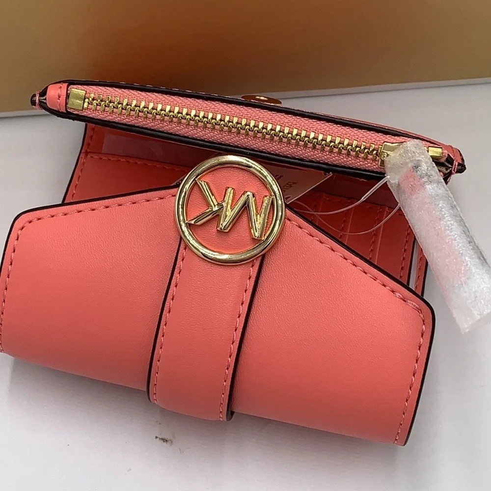 NWT MICHAEL KORS CARMEN MEDIUM FLAP BIFOLD WALLET GRAPEFRUIT COLOR